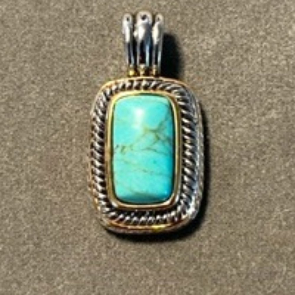 Southwest Turquoise Stone set in silver with twirled silver frame pendant